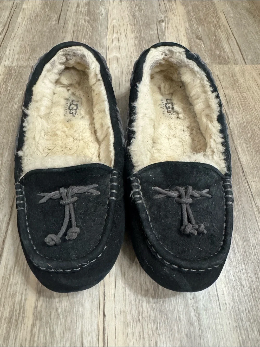 UGG Kids Black Suede Moccasin Slippers with Cream Shearling